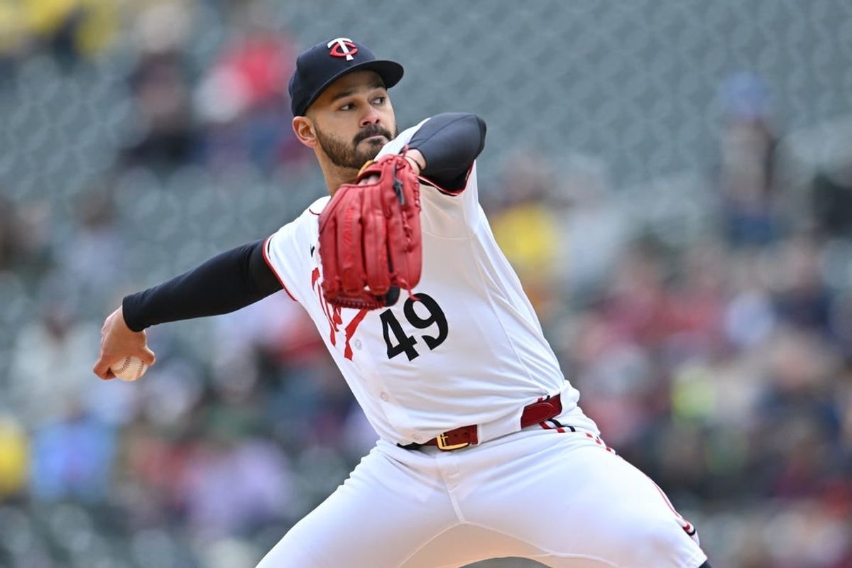 May 4, 2024; Minneapolis, Minnesota, USA; Minnesota Twins pitcher Pablo López (49) throws a pitch against the Minnesota Twins during the first inning at Target Field.