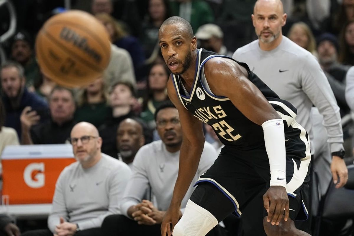 Jan 26, 2024; Milwaukee, Wisconsin, USA;  Milwaukee Bucks forward Khris Middleton (22) looks at the ball during the second quarter against the Cleveland Cavaliers at Fiserv Forum.