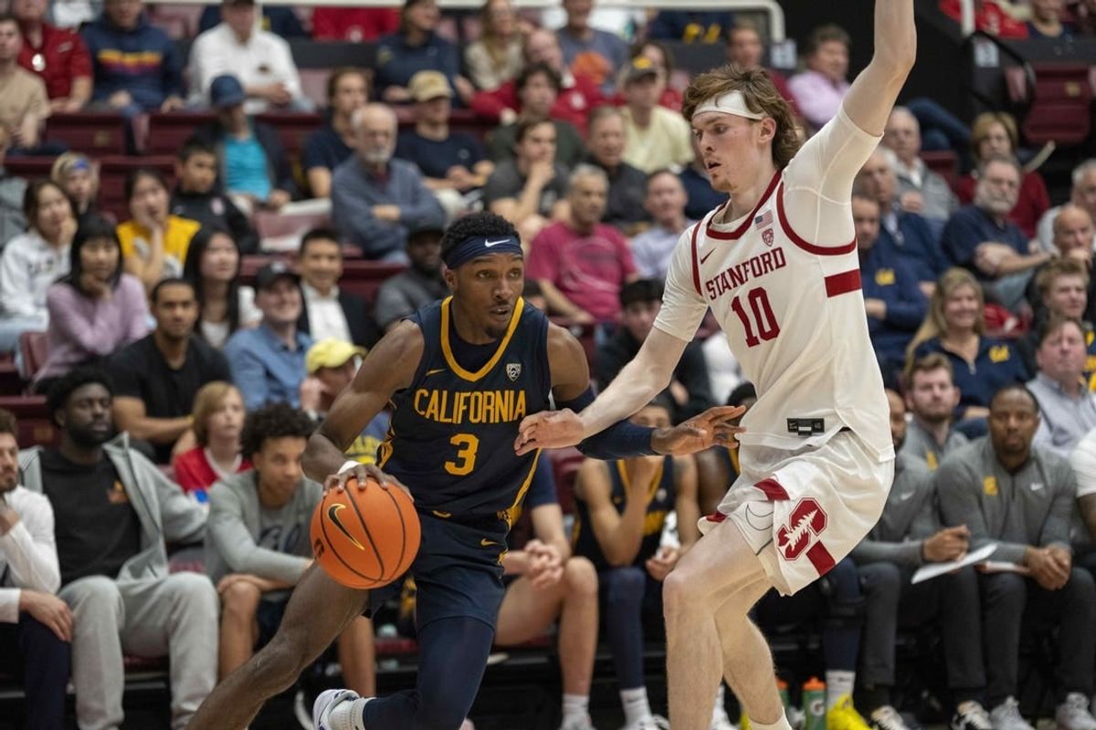 Mar 7, 2024; Stanford, California, USA; California Golden Bears guard Keonte Kennedy (3) dribbles the basketball against Stanford Cardinal forward Max Murrell (10) during the second half at Maples Pavillion.