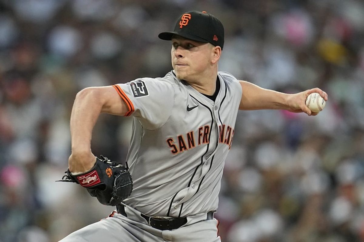Mar 29, 2024; San Diego, California, USA; San Francisco Giants starting pitcher Kyle Harrison (45) throws a pitch against the San Diego Padres during the first inning at Petco Park.