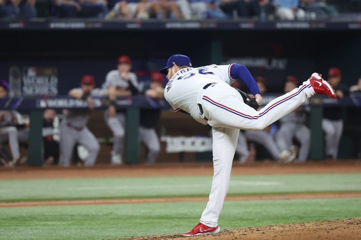 Oct 28, 2023; Arlington, TX, USA; Texas Rangers starting pitcher Jordan Montgomery (52) pitches in the in the seventh inning against the Arizona Diamondbacks in game two of the 2023 World Series at Globe Life Field.