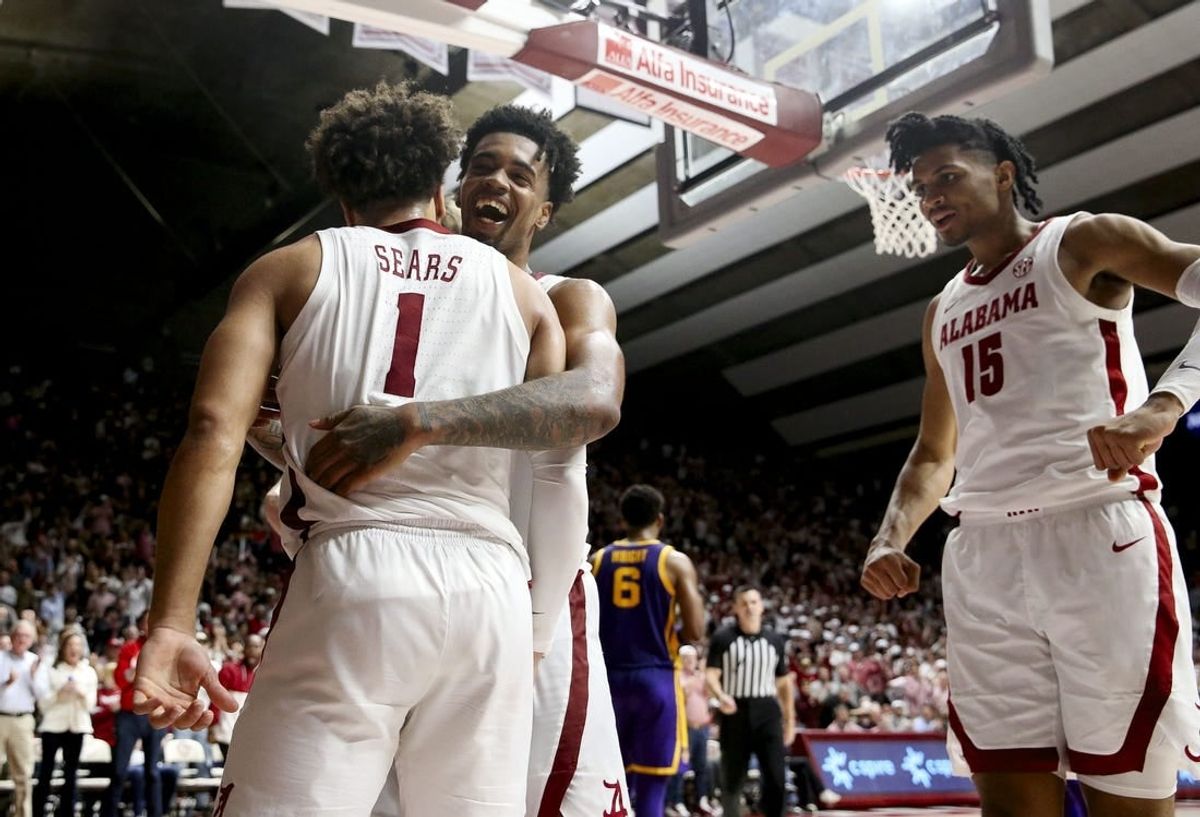 Jan 27, 2024; Tuscaloosa, Alabama, USA;   Alabama guard Mark Sears (1), Alabama guard Aaron Estrada, and Alabama forward Jarin Stevenson (15) celebrate after Sears scored at Coleman Coliseum. Alabama defeated LSU 109-88.