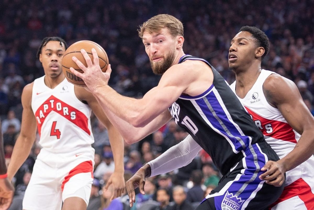 Jan 5, 2024; Sacramento, California, USA; Sacramento Kings forward Domantas Sabonis (10) controls the ball against the Toronto Raptors during the first quarter at Golden 1 Center.
