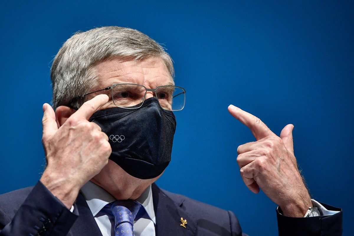 Here we see IOC President Thomas Bach wearing a mask  because he knows exactly how dangerous COVID is and how easily it spreads.
