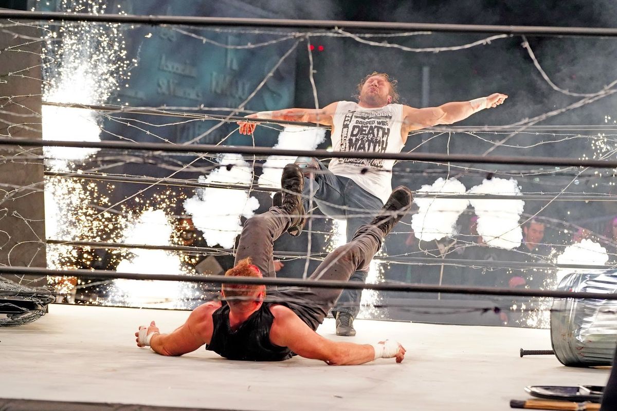 John Moxley and Kenny Omega participate in the wholesome event.
