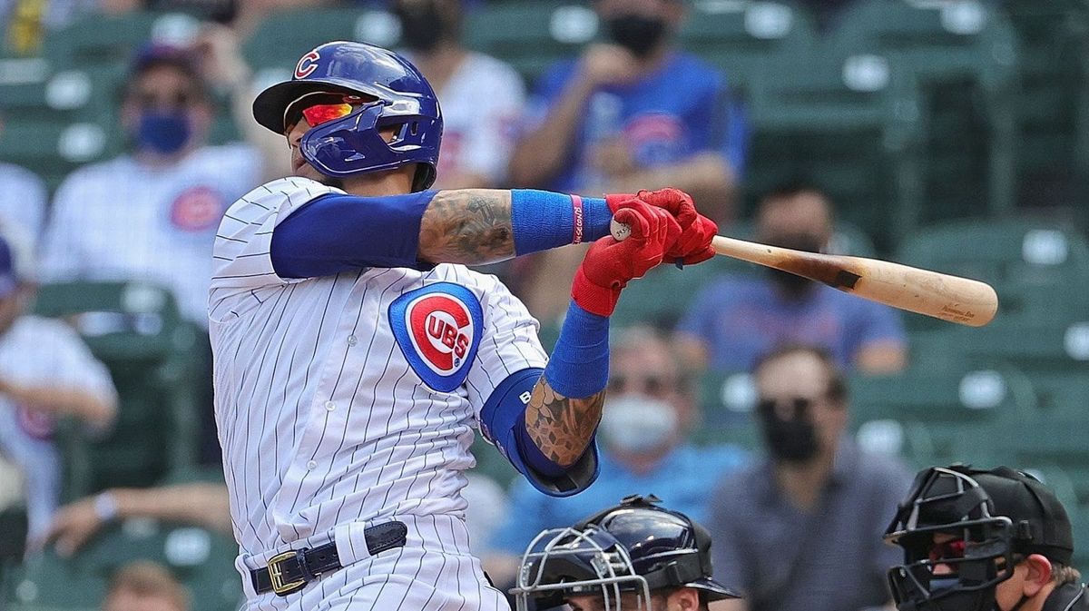 The Cubs’ Javy Baez swings (and likely misses) at the plate.