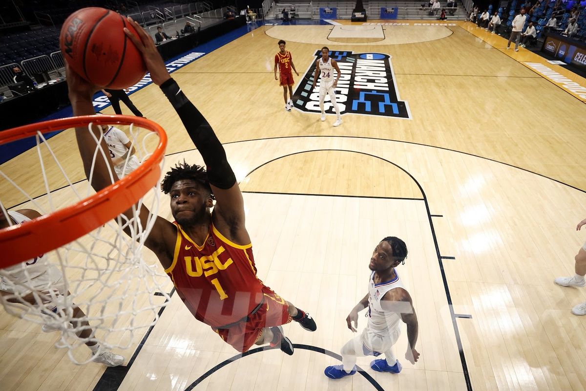 Chevez Goodwin reps  Pac-12 basketball with a throwdown against Kansas.