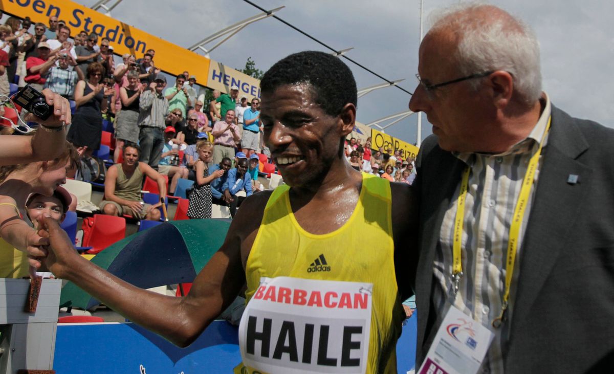 Jos Hermens and the most famous runner he represents, Haile Gebrselassie. Photo credit: Peter Dejong/ [object Object]