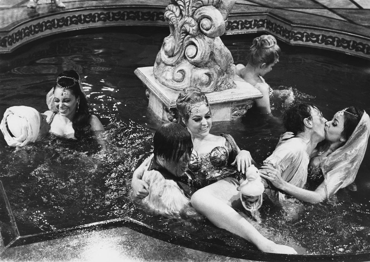 Here’s a delightful orgy scene from the 1968 British movie “Carry On Up the Khyber.” Carry on.
