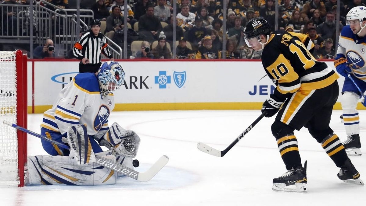 Jan 6, 2024; Pittsburgh, Pennsylvania, USA;  Buffalo Sabres goaltender Ukko-Pekka Luukkonen (1) makes a save against Pittsburgh Penguins left wing Drew O'Connor (10) during the first period at PPG Paints Arena.
