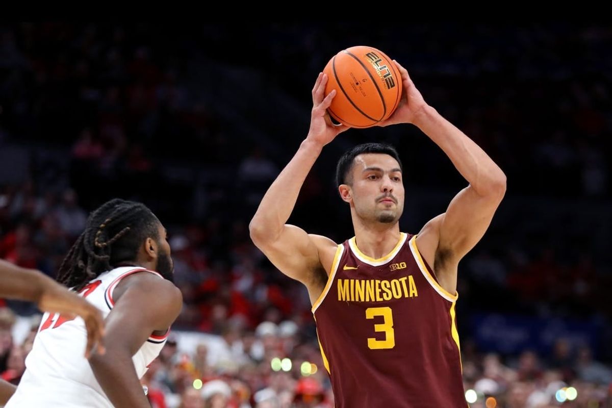 Dec 3, 2023; Columbus, Ohio, USA;  Minnesota Golden Gophers forward Dawson Garcia (3) looks to pass as Ohio State Buckeyes guard Evan Mahaffey (12) during the first half at Value City Arena.