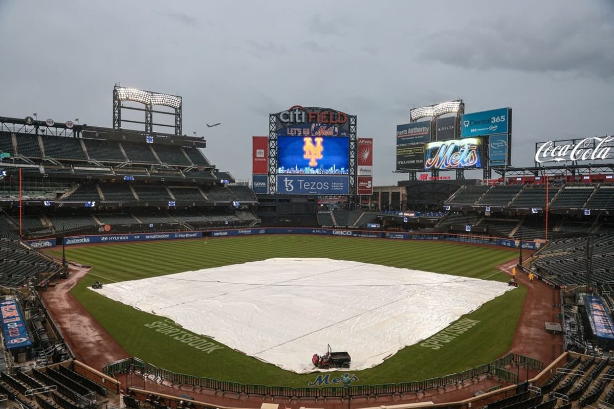 Oct 3, 2022; New York City, New York, USA; A general view of the tarp on the field before the game between the New York Mets and the Washington Nationals at Citi Field.