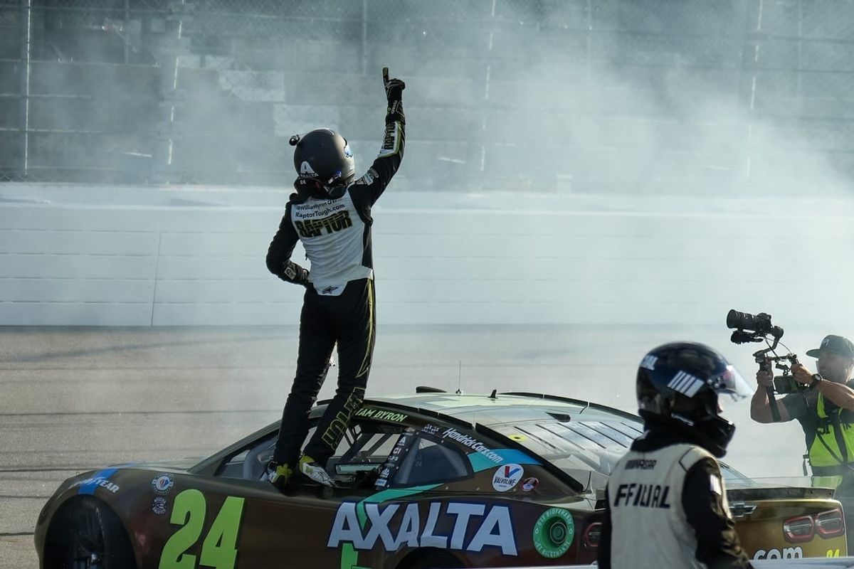 May 14, 2023; Darlington, South Carolina, USA; NASCAR Cup Series driver William Byron (24) celebrates victory at Darlington Raceway.