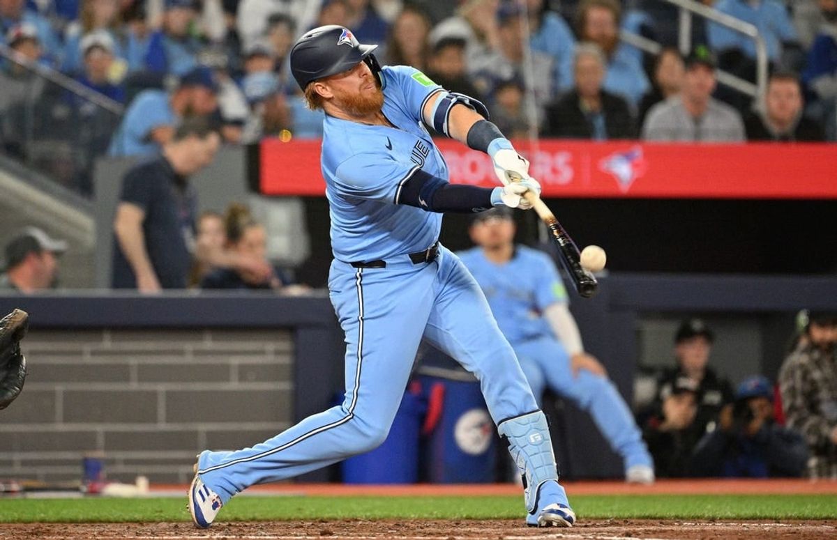 Apr 29, 2024; Toronto, Ontario, CAN; Toronto Blue Jays designated hitter Justin Turner (2) bats against the Kansas City Royals in the eighth inning at Rogers Centre. Turner hit two home runs in a 6-5 win.