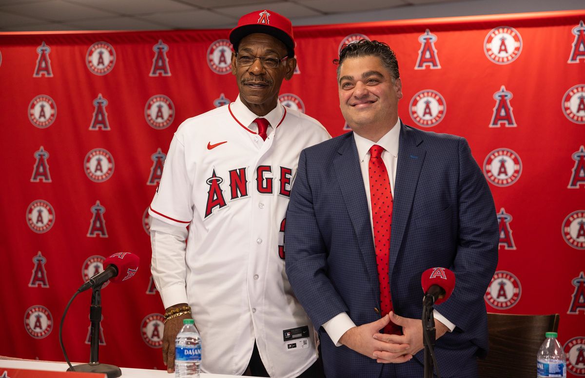 Ron Washington (l.) and Perry Minasian.