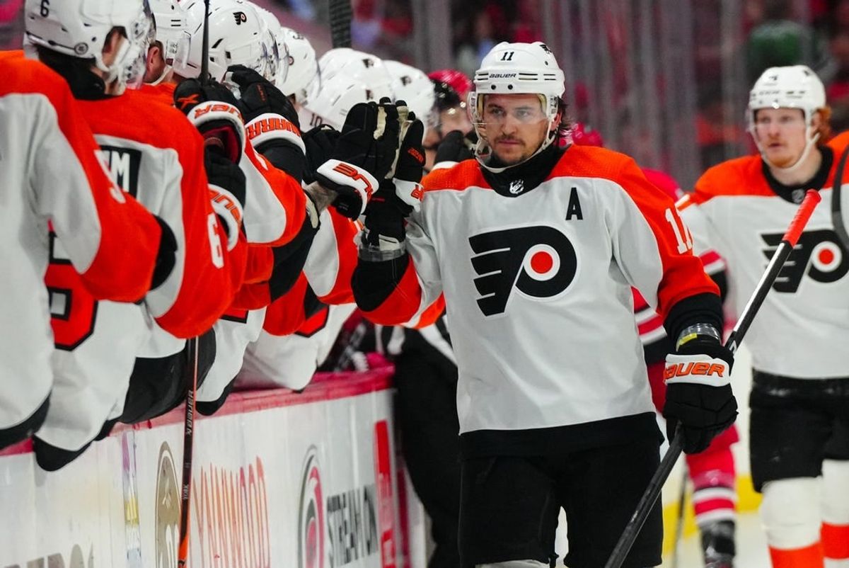 Mar 21, 2024; Raleigh, North Carolina, USA; Philadelphia Flyers right wing Travis Konecny (11) celebrates his goal against the Carolina Hurricanes during the third period at PNC Arena.