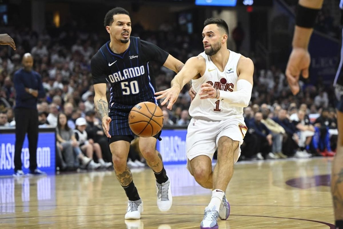 Apr 22, 2024; Cleveland, Ohio, USA; Cleveland Cavaliers guard Max Strus (1) throws a pass beside Orlando Magic guard Cole Anthony (50) in the second quarter during game two of the first round of the 2024 NBA playoffs at Rocket Mortgage FieldHouse.