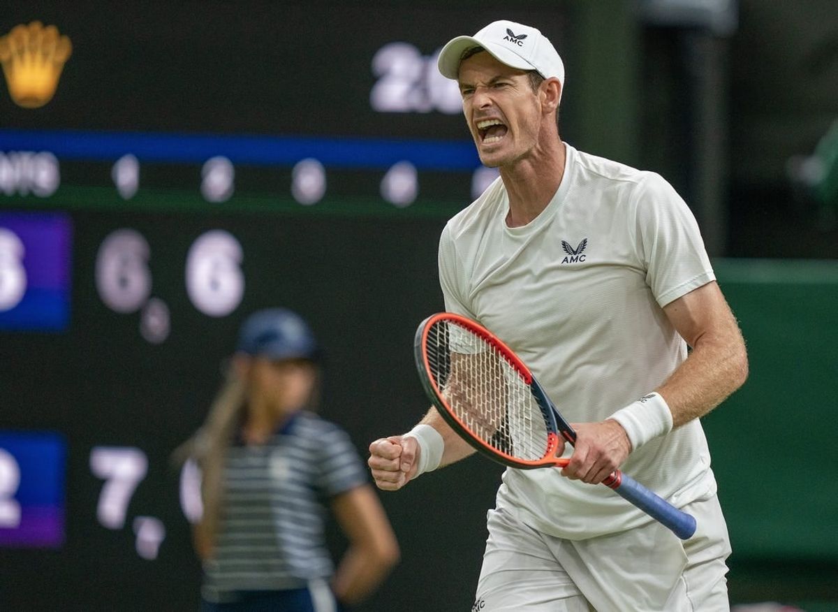 Jul 6, 2023; London, United Kingdom; Andy Murray (GBR) reacts to a point during his match against Stefanos Tsitsipas (GRE) on day four at the All England Lawn Tennis and Croquet Club.