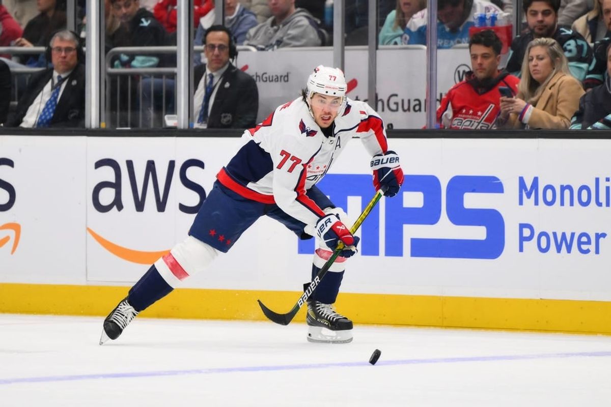 Mar 14, 2024; Seattle, Washington, USA; Washington Capitals right wing T.J. Oshie (77) plays the puck during the third period against the Seattle Kraken at Climate Pledge Arena.