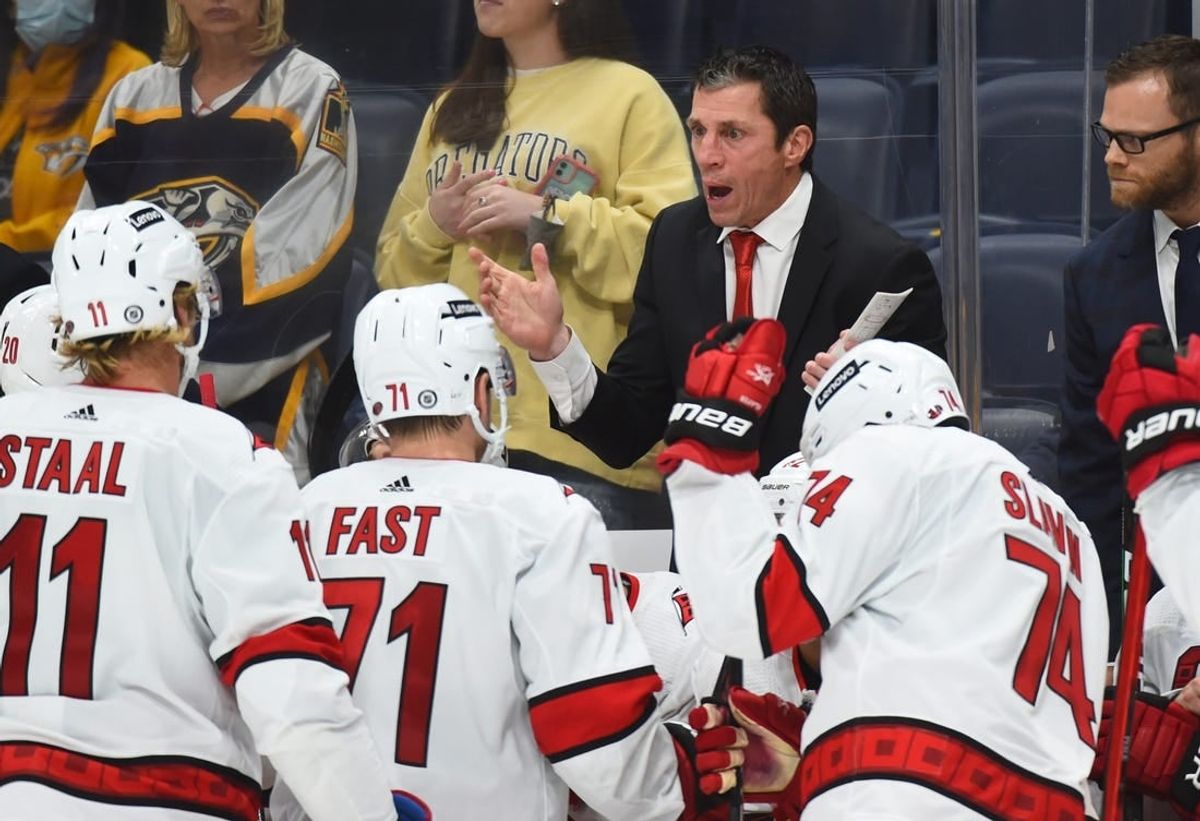 Oct 16, 2021; Nashville, Tennessee, USA; Carolina Hurricanes head coach Rod Brind'Amour talks during a timeout during the third period against the Nashville Predators at Bridgestone Arena.