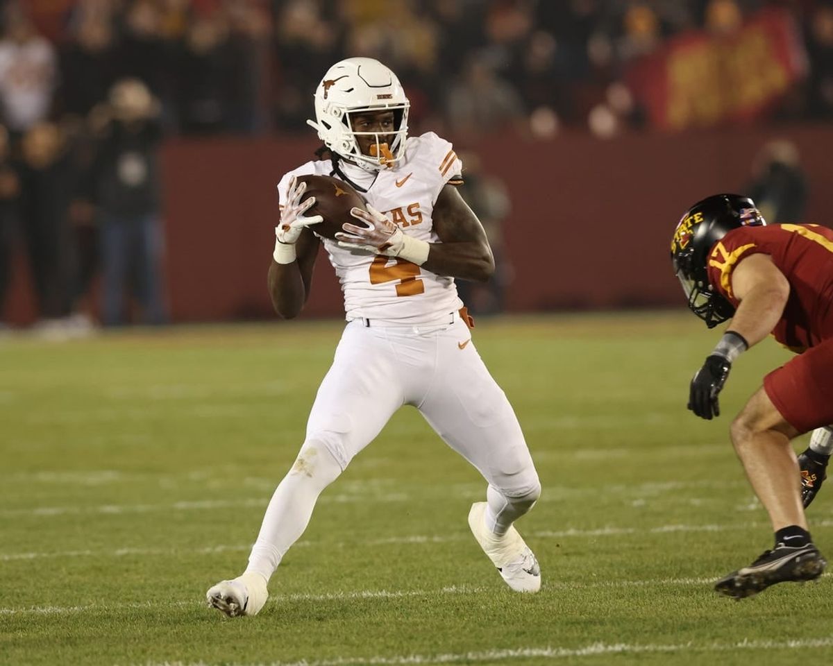 Nov 18, 2023; Ames, Iowa, USA; Texas Longhorns running back CJ Baxter (4) catches a pass against the Iowa State Cyclones at Jack Trice Stadium.