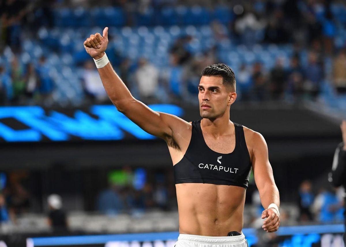 Oct 5, 2022; Charlotte, North Carolina, USA; Charlotte FC forward Daniel Rios (12) signals to the fans after the game at Bank of America Stadium.