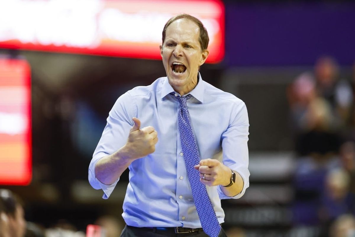 Jan 26, 2023; Seattle, Washington, USA; Washington Huskies head coach Mike Hopkins speaks to players on the bench during the second half against the Arizona State Sun Devils at Alaska Airlines Arena at Hec Edmundson Pavilion.