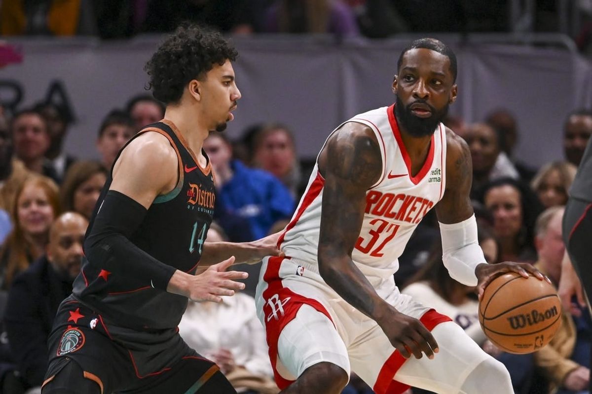 Mar 19, 2024; Washington, District of Columbia, USA; Houston Rockets forward Jeff Green (32) dribbles a sWashington Wizards guard Jules Bernard (14) defends during the first half  at Capital One Arena.