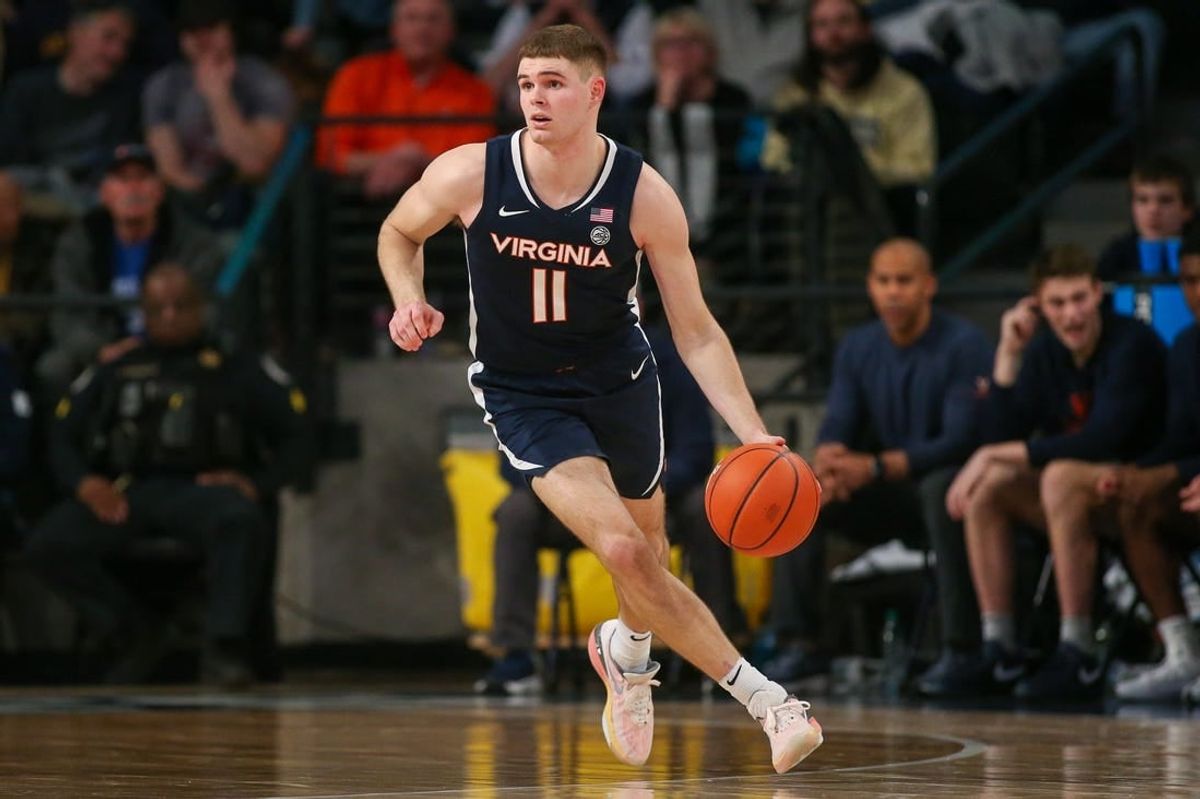 Jan 20, 2024; Atlanta, Georgia, USA; Virginia Cavaliers guard Isaac McKneely (11) dribbles against the Georgia Tech Yellow Jackets in the second half at McCamish Pavilion.