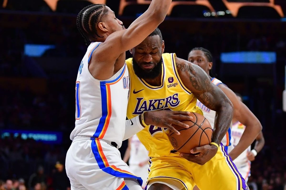 Mar 4, 2024; Los Angeles, California, USA; Los Angeles Lakers forward LeBron James (23) moves to the basket against Oklahoma City Thunder guard Aaron Wiggins (21) during the first half at Crypto.com Arena.