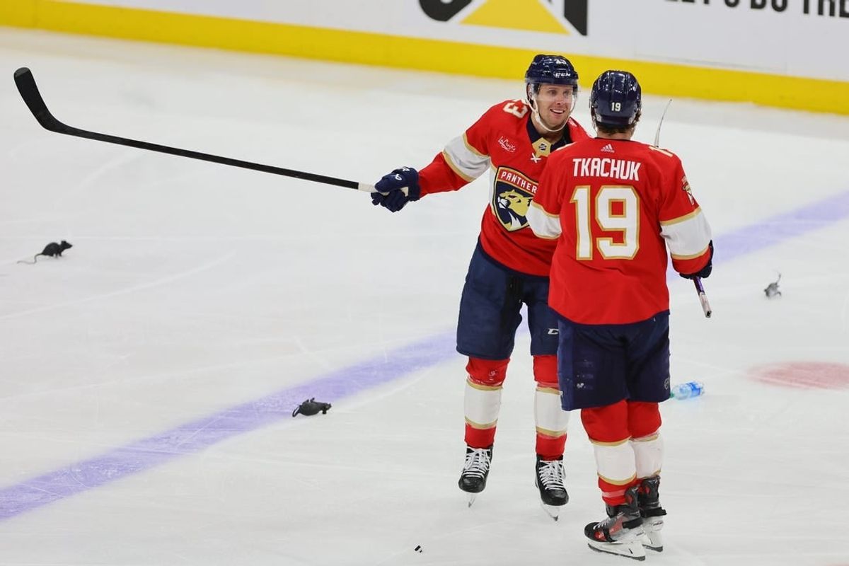 Apr 23, 2024; Sunrise, Florida, USA; Florida Panthers center Carter Verhaeghe (23) celebrates with left wing Matthew Tkachuk (19) after an overtime win against the Tampa Bay Lightning in game two of the first round of the 2024 Stanley Cup Playoffs at Amerant Bank Arena.
