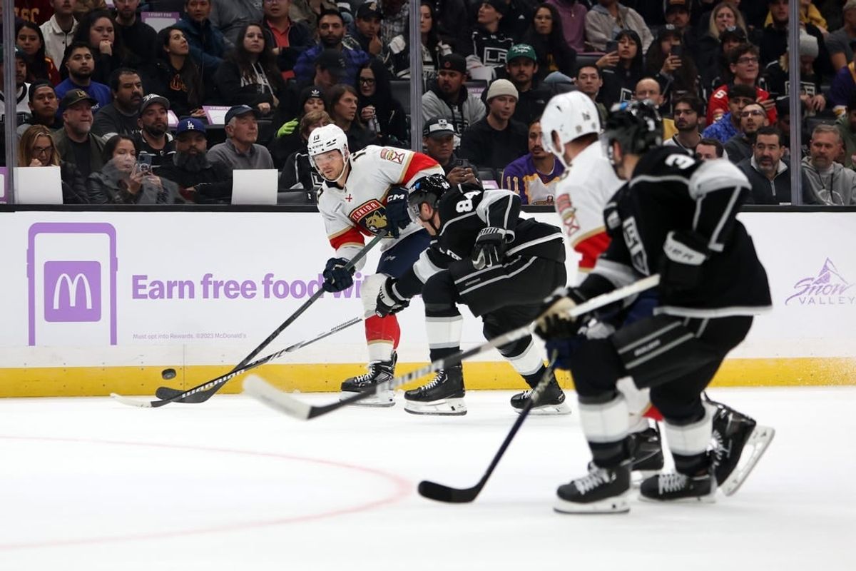 Nov 16, 2023; Los Angeles, California, USA; Florida Panthers center Sam Reinhart (13) passes the puck during the first period against the Los Angeles Kings at Crypto.com Arena.