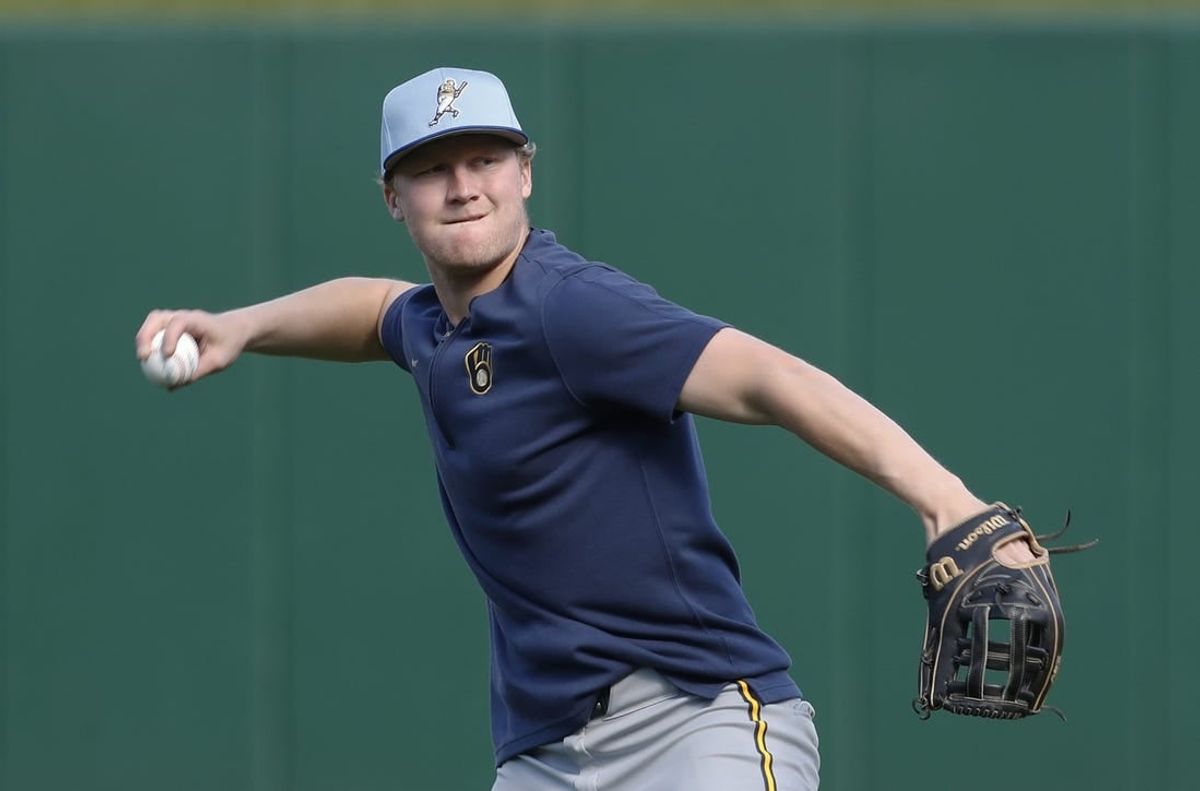 Apr 22, 2024; Pittsburgh, Pennsylvania, USA;  Milwaukee Brewers outfielder Joey Wiemer (28) warms up before a game against the Pittsburgh Pirates at PNC Park.