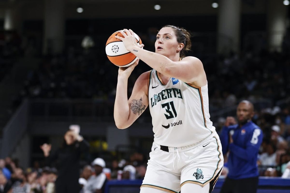 Jul 29, 2022; Chicago, Illinois, USA; New York Liberty center Stefanie Dolson (31) shoots against the Chicago Sky during the second half of the WNBA game at Wintrust Arena.