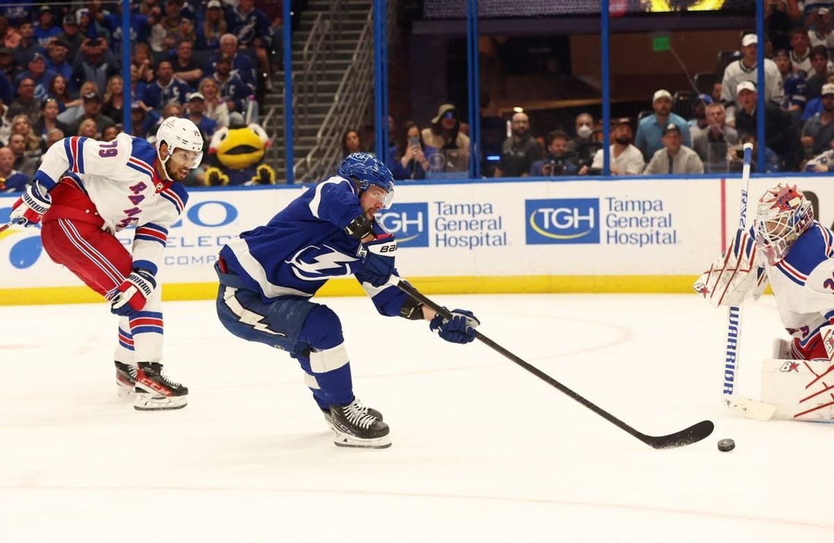 Mar 14, 2024; Tampa, Florida, USA; Tampa Bay Lightning right wing Nikita Kucherov (86) shoots on New York Rangers goaltender Igor Shesterkin (31) as defenseman K'Andre Miller (79) defends during the third period at Amalie Arena.