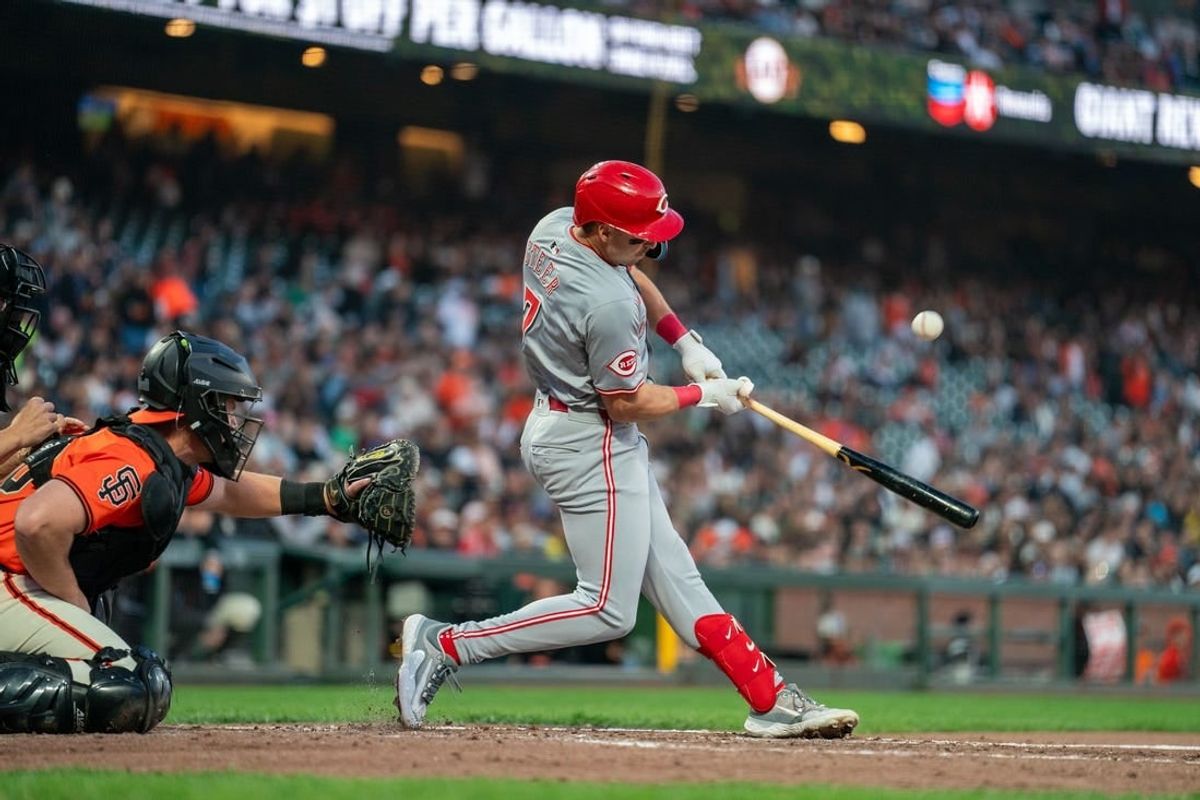 May 10, 2024; San Francisco, California, USA; Cincinnati Reds first baseman Spencer Steer (7) hits an RBI single against the San Francisco Giants third inning at Oracle Park.