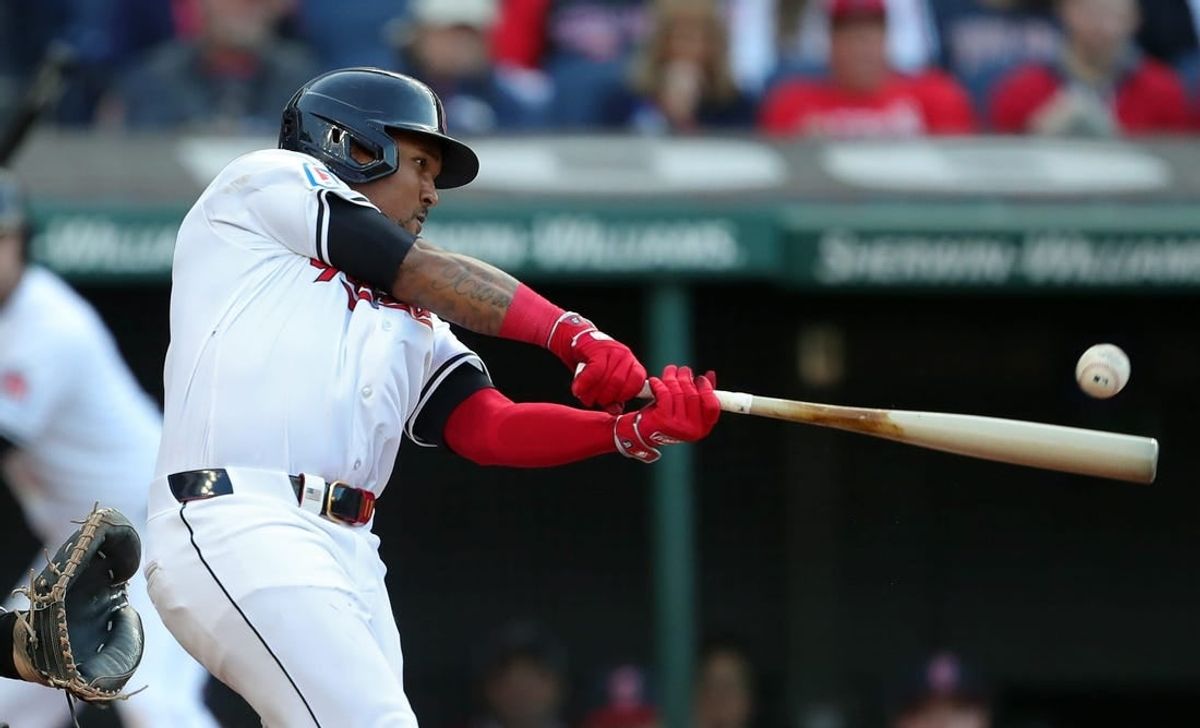 Cleveland Guardians third baseman Jose Ramirez (11) connects with a pitch during the fifth inning of the Cleveland Guardians' home opener against the Chicago White Sox, Monday, April 8, 2024, in Cleveland, Ohio.