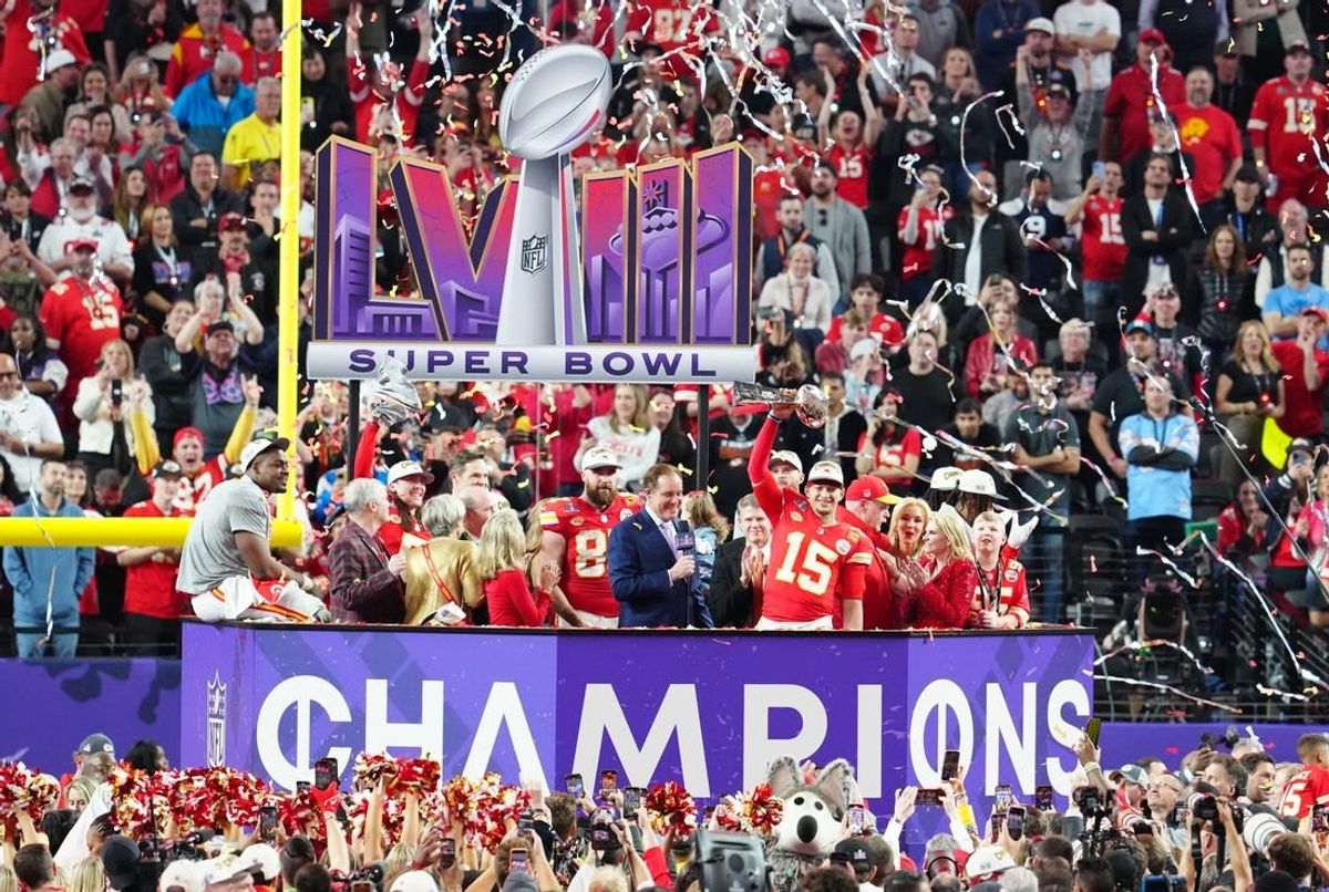 Feb 11, 2024; Paradise, Nevada, USA;  Kansas City Chiefs quarterback Patrick Mahomes (15) hoists the Vince Lombardi Trophy after defeating the San Francisco 49ers in Super Bowl LVIII at Allegiant Stadium.