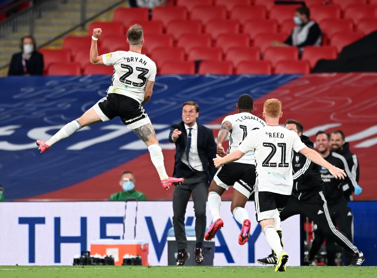 Joe Bryan celebrates after scoring for Fulham