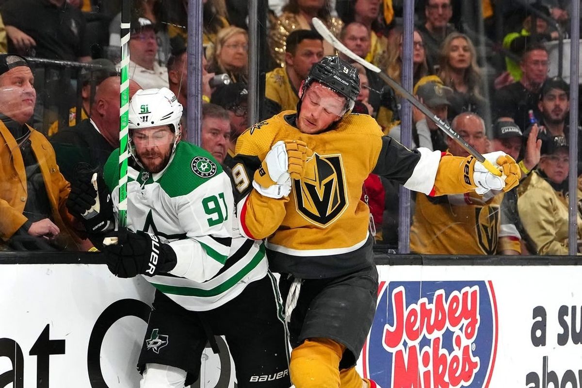 May 3, 2024; Las Vegas, Nevada, USA; Vegas Golden Knights center Jack Eichel (9) checks Dallas Stars center Tyler Seguin (91) during the second period of game six of the first round of the 2024 Stanley Cup Playoffs at T-Mobile Arena.