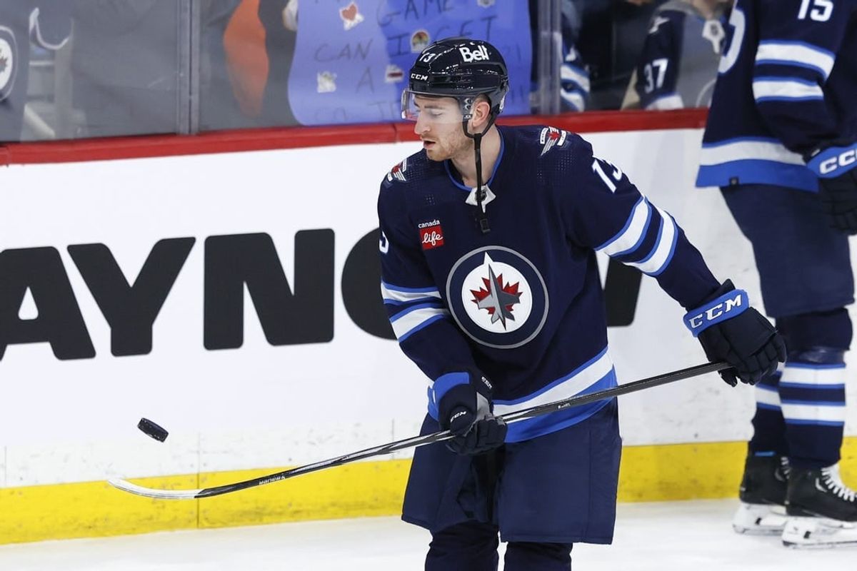 Feb 25, 2024; Winnipeg, Manitoba, CAN; Winnipeg Jets center Gabriel Vilardi (13) puck juggles before a game against the Arizona Coyotes at Canada Life Centre.