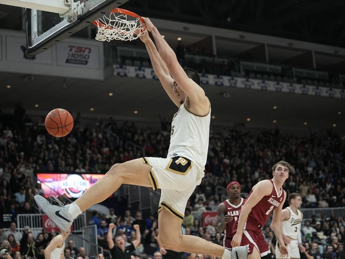 Purdue Boilermakers center Zach Edey (15) dunks against the Alabama Crimson Tide during the second half at Coca-Cola Coliseum.
