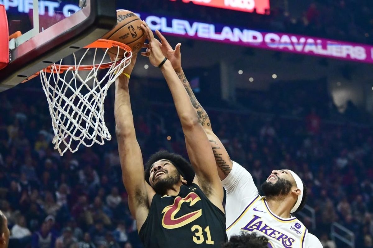 Nov 25, 2023; Cleveland, Ohio, USA; Cleveland Cavaliers center Jarrett Allen (31) drives to the basket against Los Angeles Lakers forward Anthony Davis (3) during the first half at Rocket Mortgage FieldHouse.