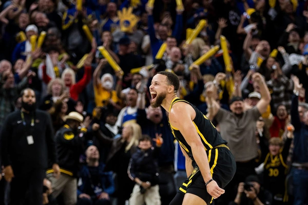 Feb 10, 2024; San Francisco, California, USA; Golden State Warriors guard Stephen Curry (30) reacts after hitting a three-ppont shot in the last second against the Phoenix Suns during the second half at Chase Center.