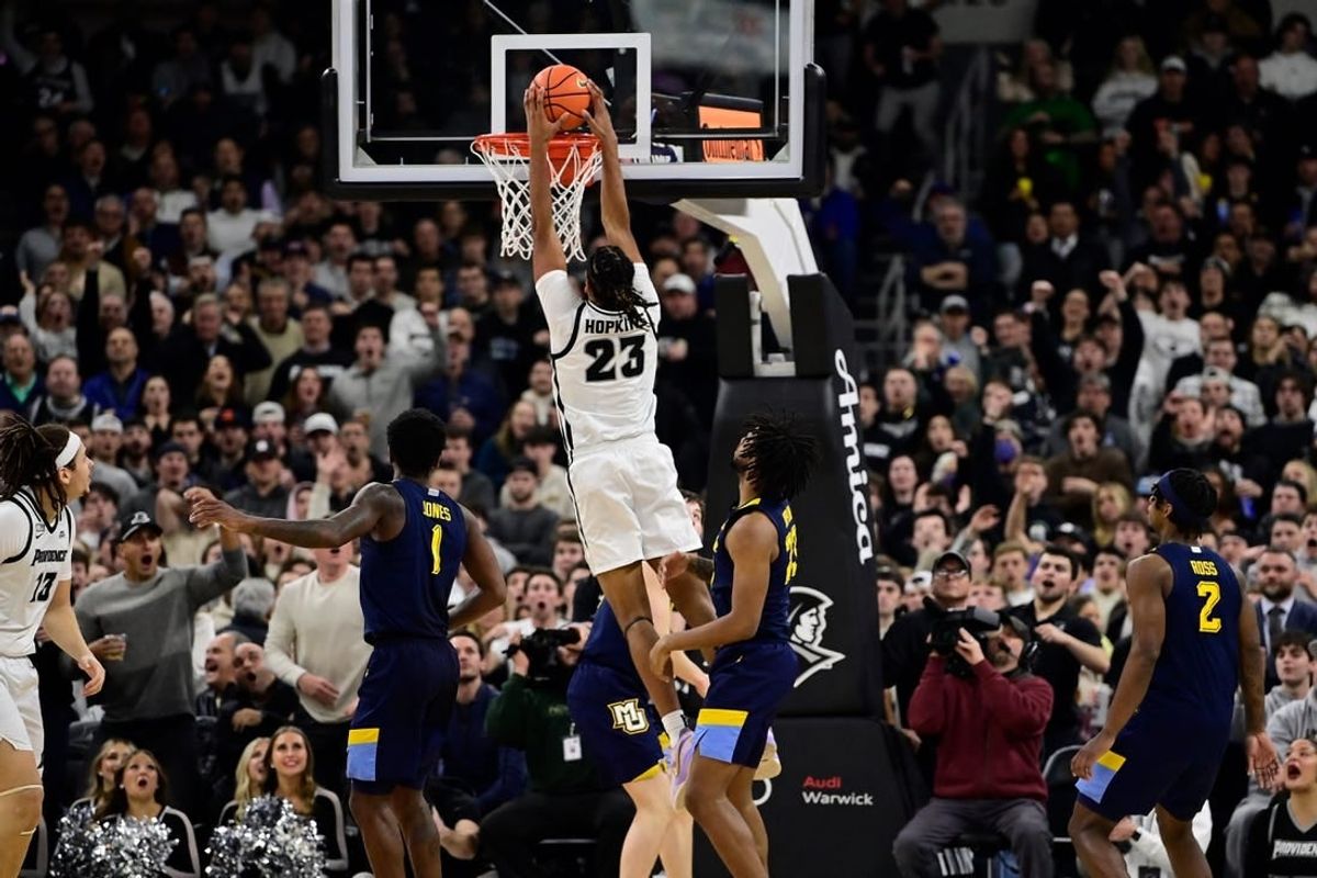 Dec 19, 2023; Providence, Rhode Island, USA; Providence Friars forward Bryce Hopkins (23) dunks the ball against the Marquette Golden Eagles at Amica Mutual Pavilion.