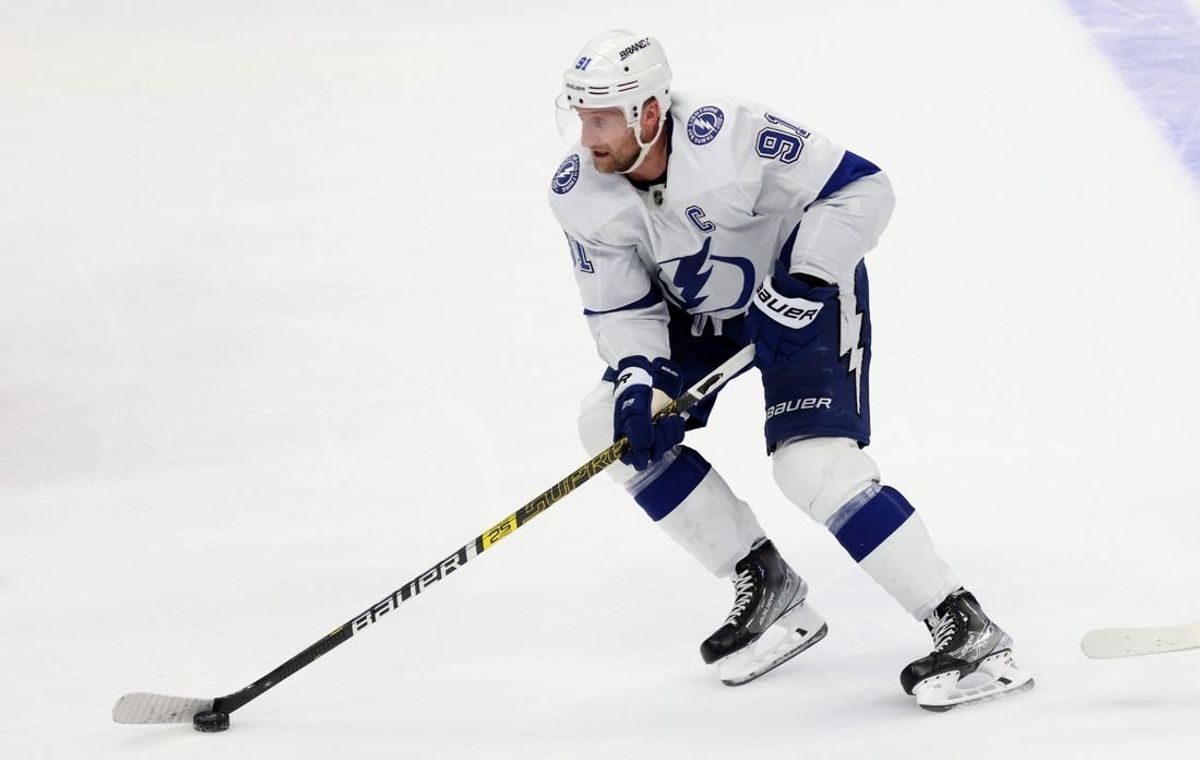 Mar 24, 2024; Anaheim, California, USA; Tampa Bay Lightning center Steven Stamkos (91) skates with the puck during overtime against the Anaheim Ducks at Honda Center.