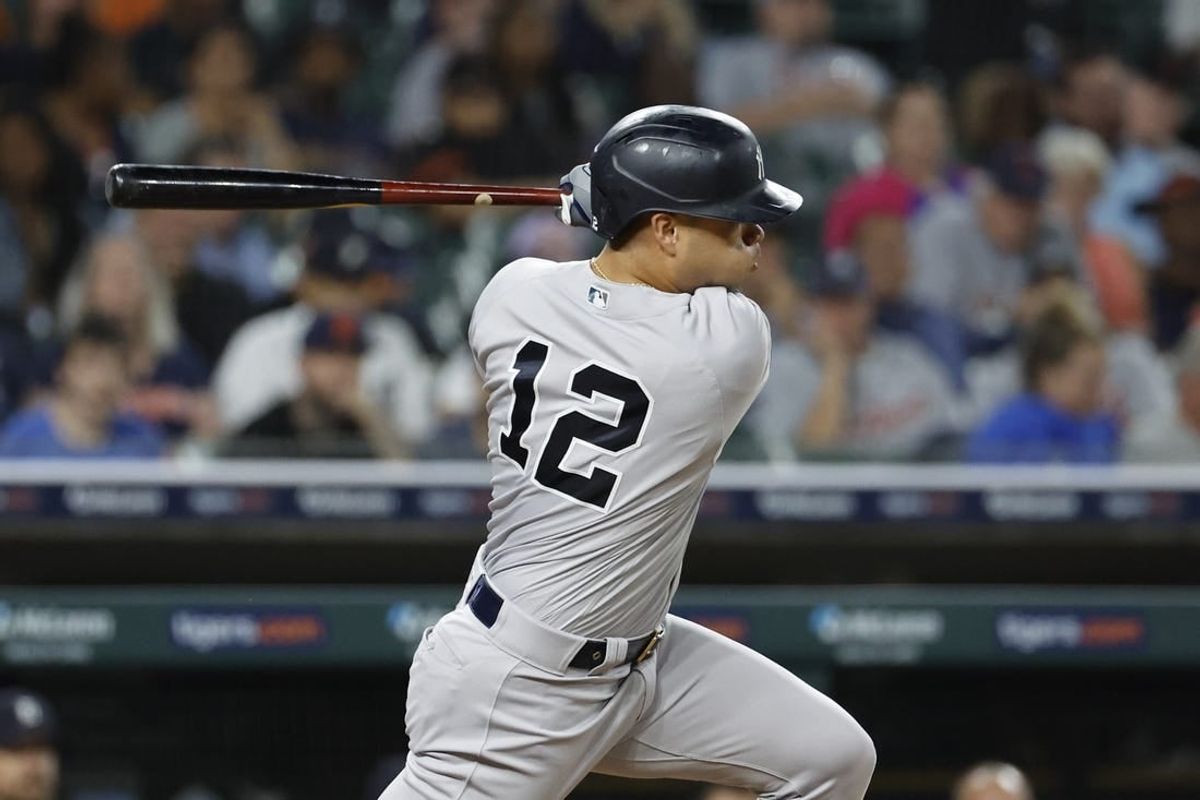 Aug 28, 2023; Detroit, Michigan, USA;  New York Yankees center fielder Isiah Kiner-Falefa (12) hits a single in the eighth inning against the Detroit Tigers at Comerica Park.