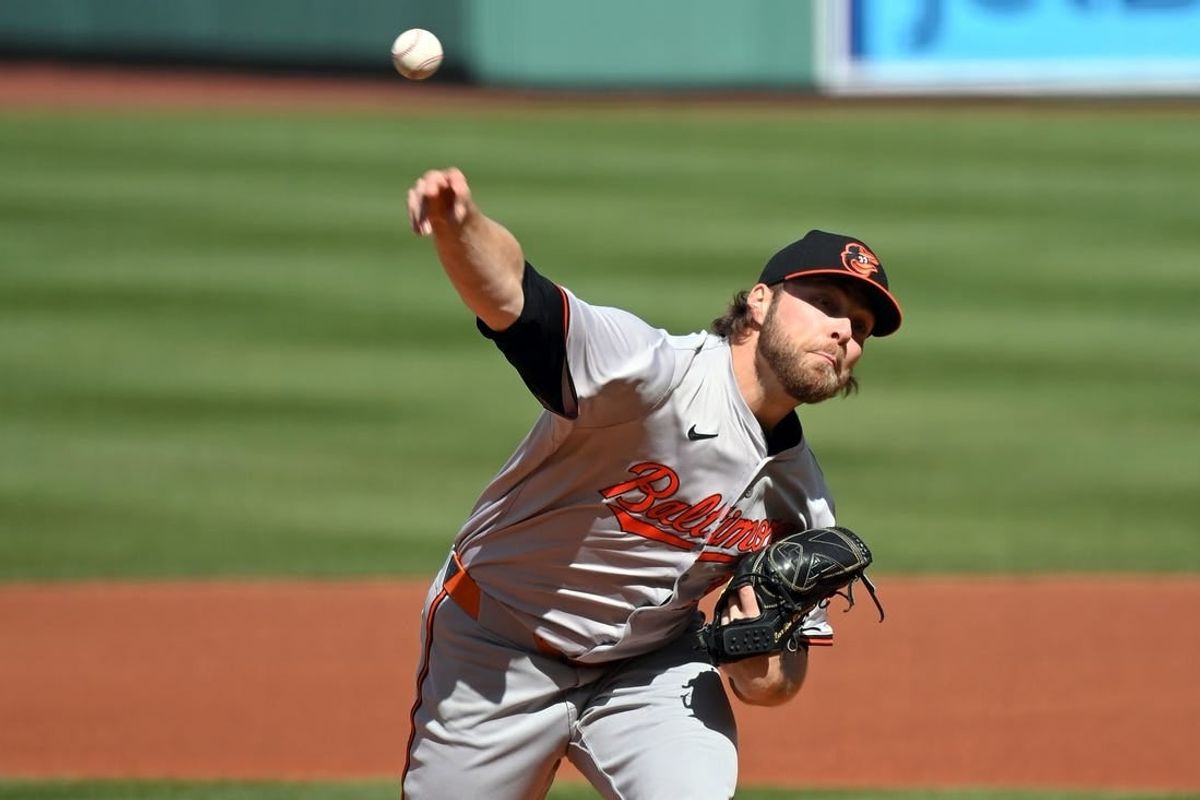 Apr 9, 2024; Boston, Massachusetts, USA; Baltimore Orioles starting pitcher Corbin Burnes (39) throws against the Boston Red Sox during the first inning at Fenway Park.