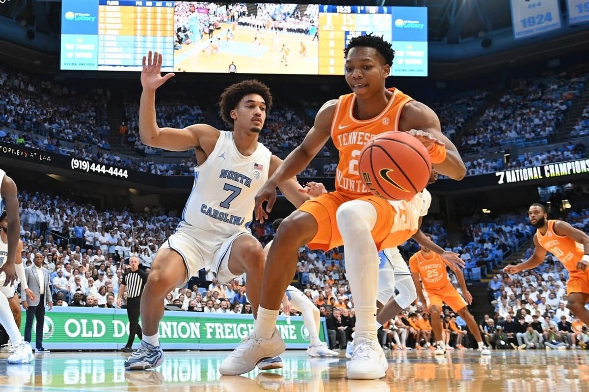 Nov 29, 2023; Chapel Hill, North Carolina, USA; Tennessee Volunteers guard Jordan Gainey (2) dribbles as North Carolina Tar Heels guard Seth Trimble (7) defends in the first half at Dean E. Smith Center.