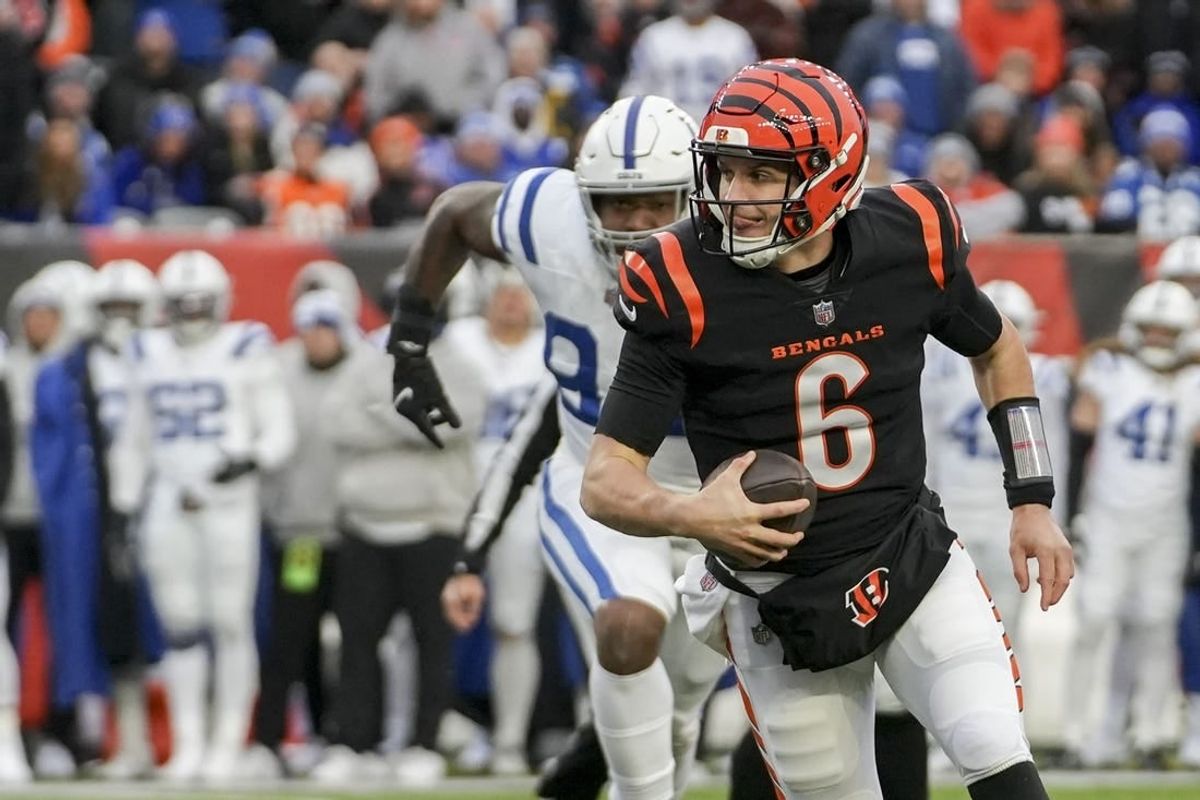 Dec 10, 2023; Cincinnati, Ohio, USA; Cincinnati Bengals quarterback Jake Browning (6) scrambles with the ball at Paycor Stadium.
